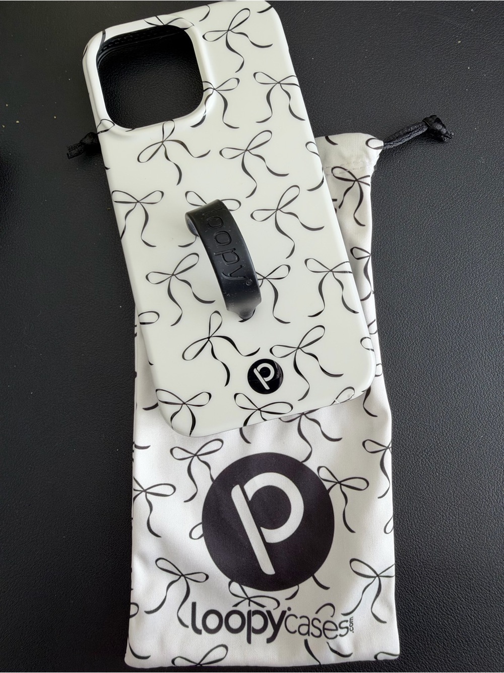Loopy Case White Bow Pattern iPhone 15 pro max Case with Black Loopy Grip